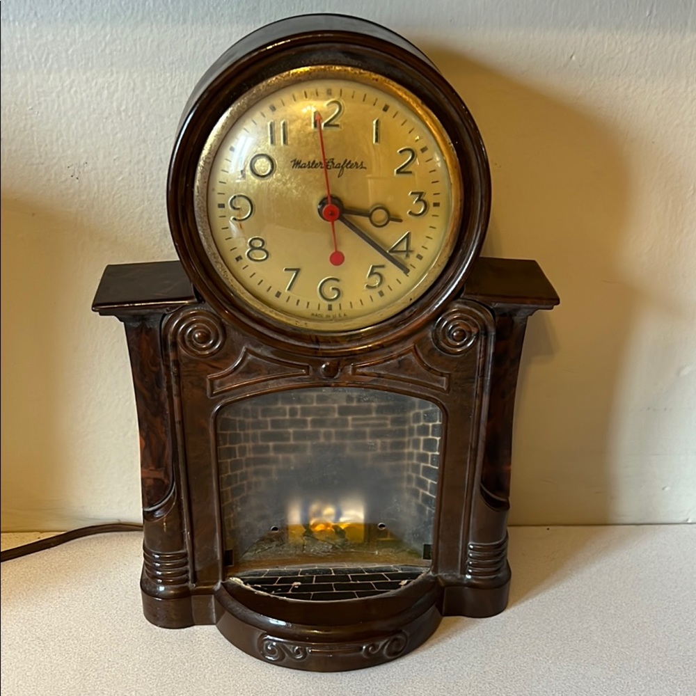 Brown Mantel Clock with Fireplace Design